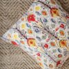 rosy snow white ikat print cushion covers